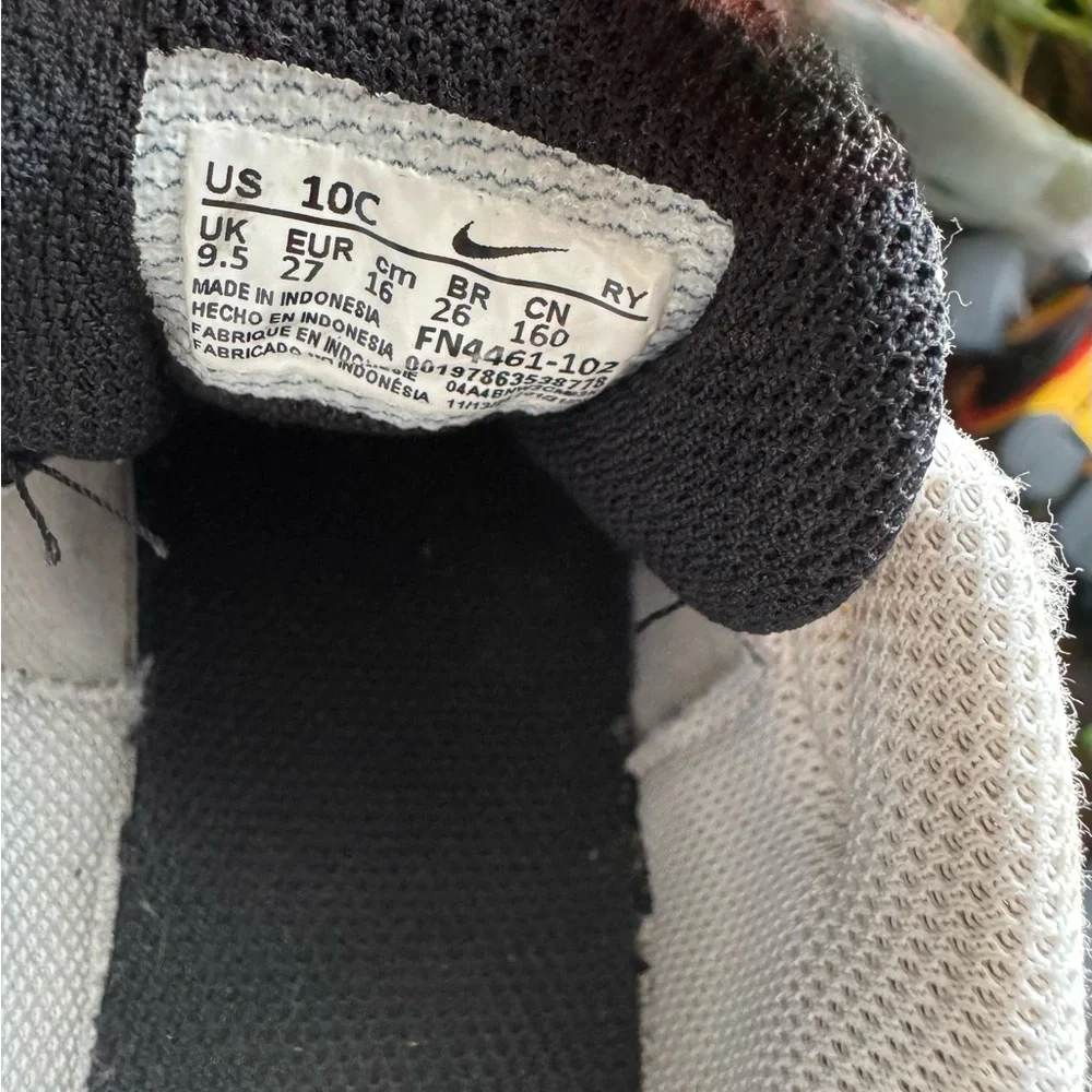 Nike Kids White and Black Sneakers with Red Swoosh